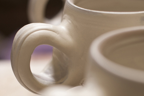large round mugs, handle detail